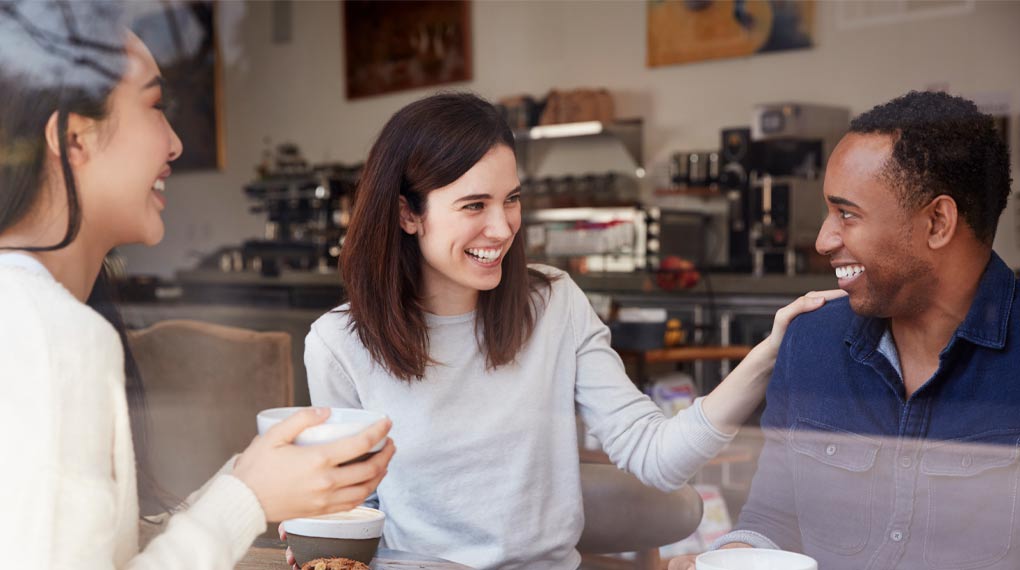 Friends having fun in a cafe